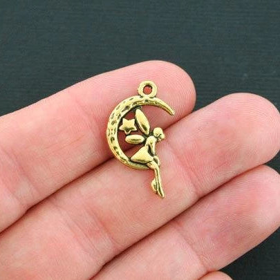 8 breloques féeriques dorées antiques - GC497