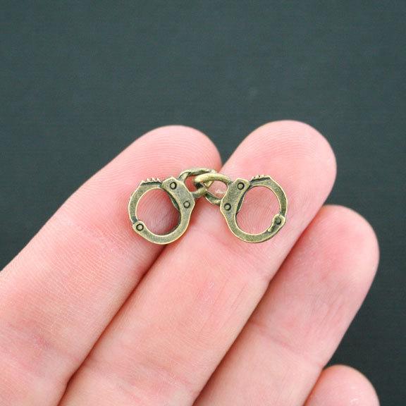 8 Menottes Bronze Antique Tone Charms 2 Faces - BC1333