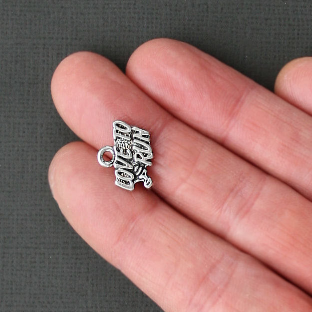 8 breloques en argent antique Love to Run - SC1787