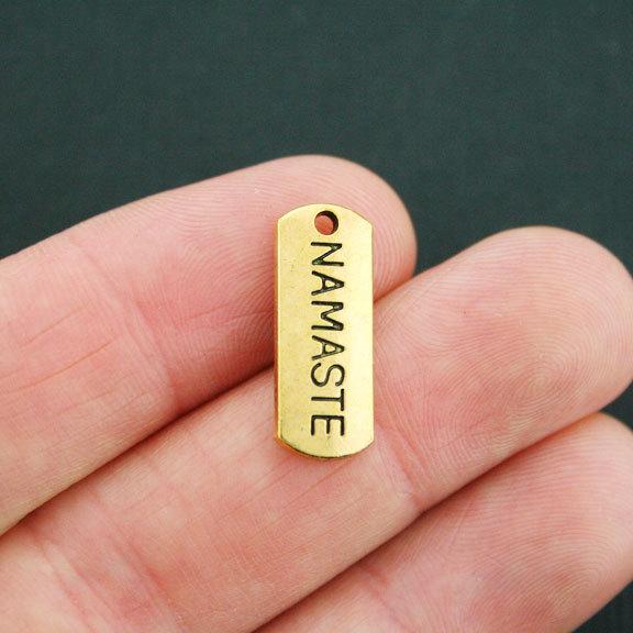 8 Namaste Antique Gold Tone Charms - GC631