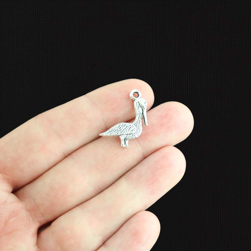 8 Pelican Antique Silver Tone Charms 2 Sided  - SC371