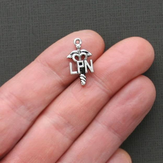 8 Practical Nurse Antique Silver Tone Charms - SC1793