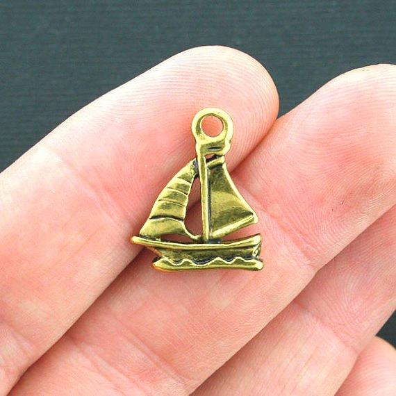 8 Sailboat Antique Gold Tone Charms 2 Sided - GC411
