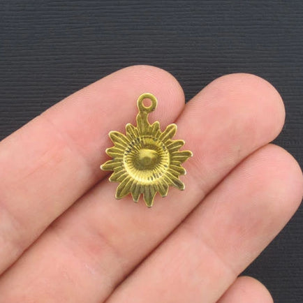 8 breloques dorées antiques soleil - GC261