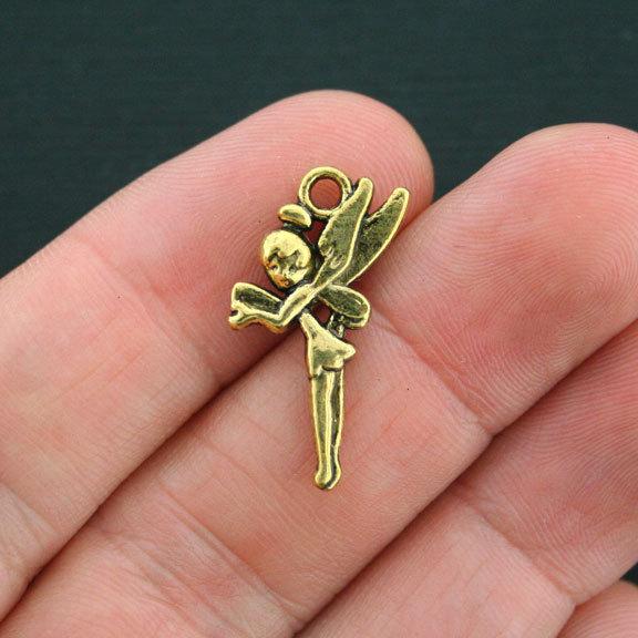 https://www.bohemianfindings.com/cdn/shop/products/8-fairy-charms-antique-gold-tone-2-sided-gc403-craft-supplies-tools-beads-gems-cabochons-pendants-bohemian-findings_676_800x.jpg?v=1565288139