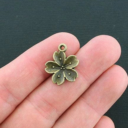 8 Flower Antique Bronze Tone Charms - BC1266