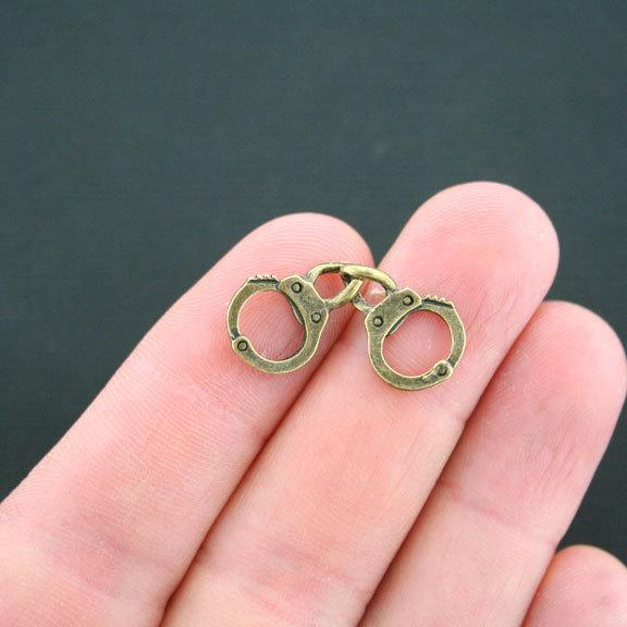 8 Handcuffs Antique Bronze Tone Charms 2 Sided - BC1333