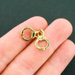 8 Handcuffs Antique Gold Tone Charms 2 Sided - GC475
