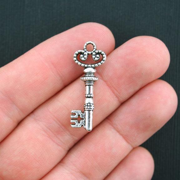 8 Key Antique Silver Tone Charms 2 Sided - SC3559