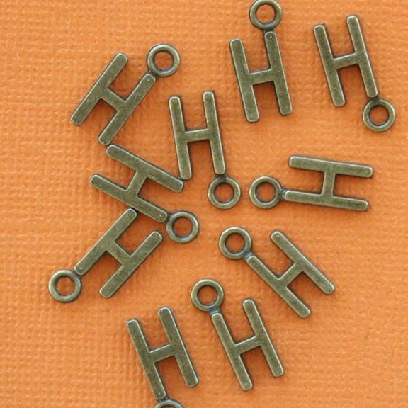 8 breloques de ton bronze antique lettre H - BC720