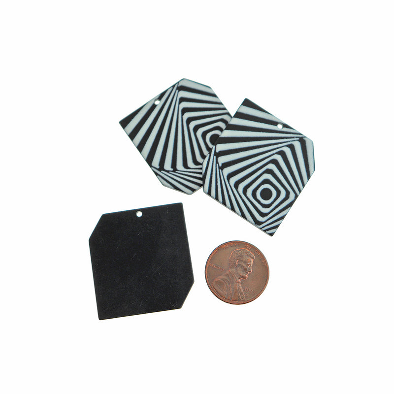 2 breloques acryliques géométriques noires et blanches - K572