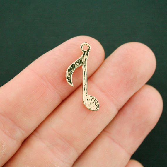 4 Music Note Gold Tone Charms - GC838