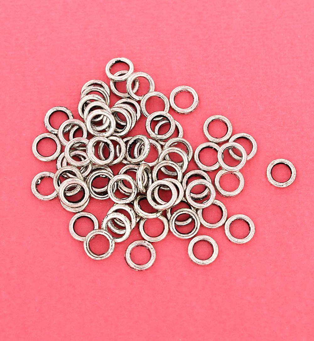 Anneaux argentés antiques 8 mm x 1,6 mm - Calibre 14 fermé - 50 anneaux - J089