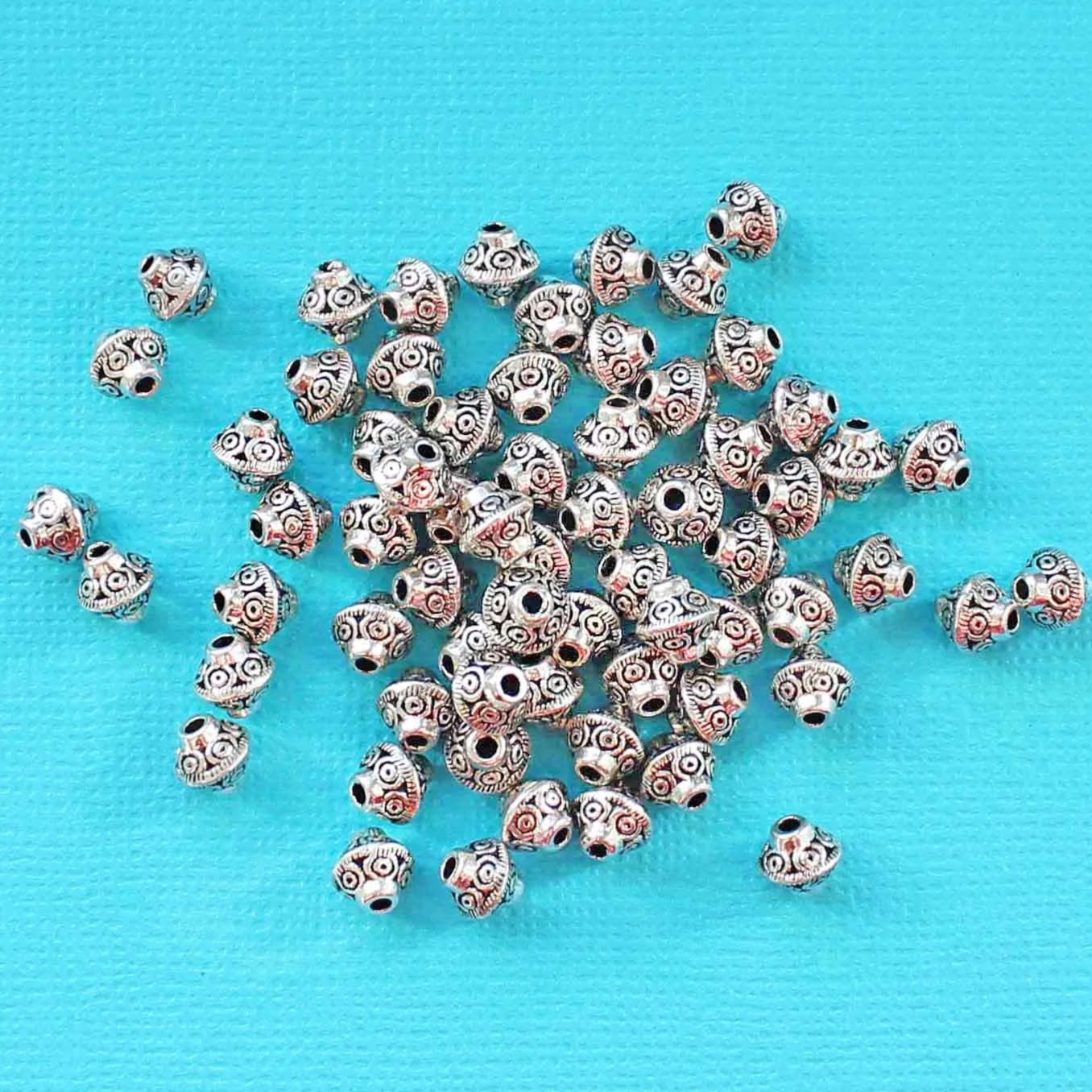 Perles intercalaires toupies 6 mm - ton argent - 20 perles - SC5788