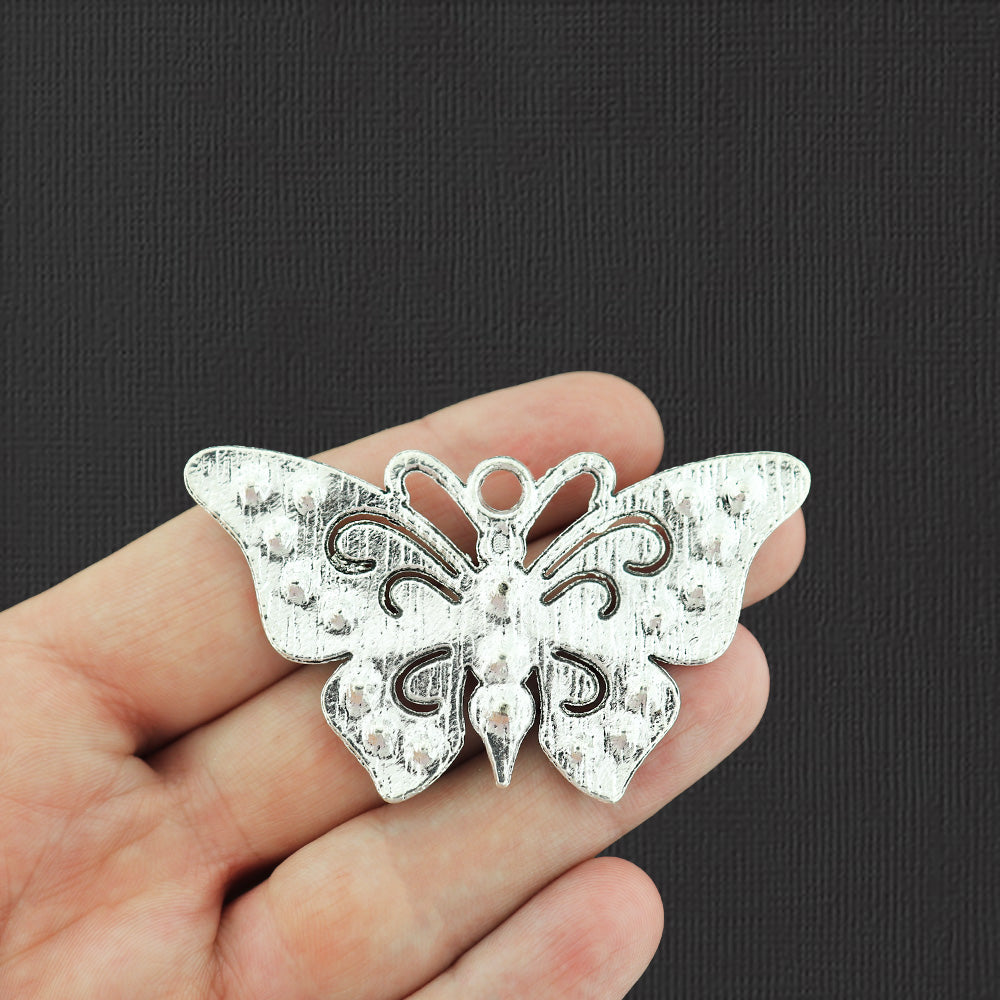 Breloque papillon ton argent antique avec strass incrustés - SC6472