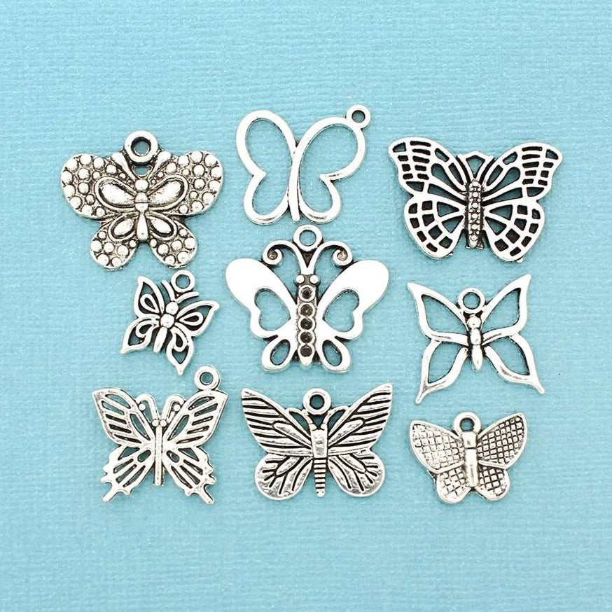 Collection de breloques papillon ton argent antique 9 breloques différentes - COL365