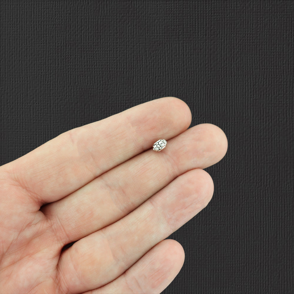 Perles d'espacement marguerite 4 mm x 6 mm - ton argent antique - 50 perles - SC6998