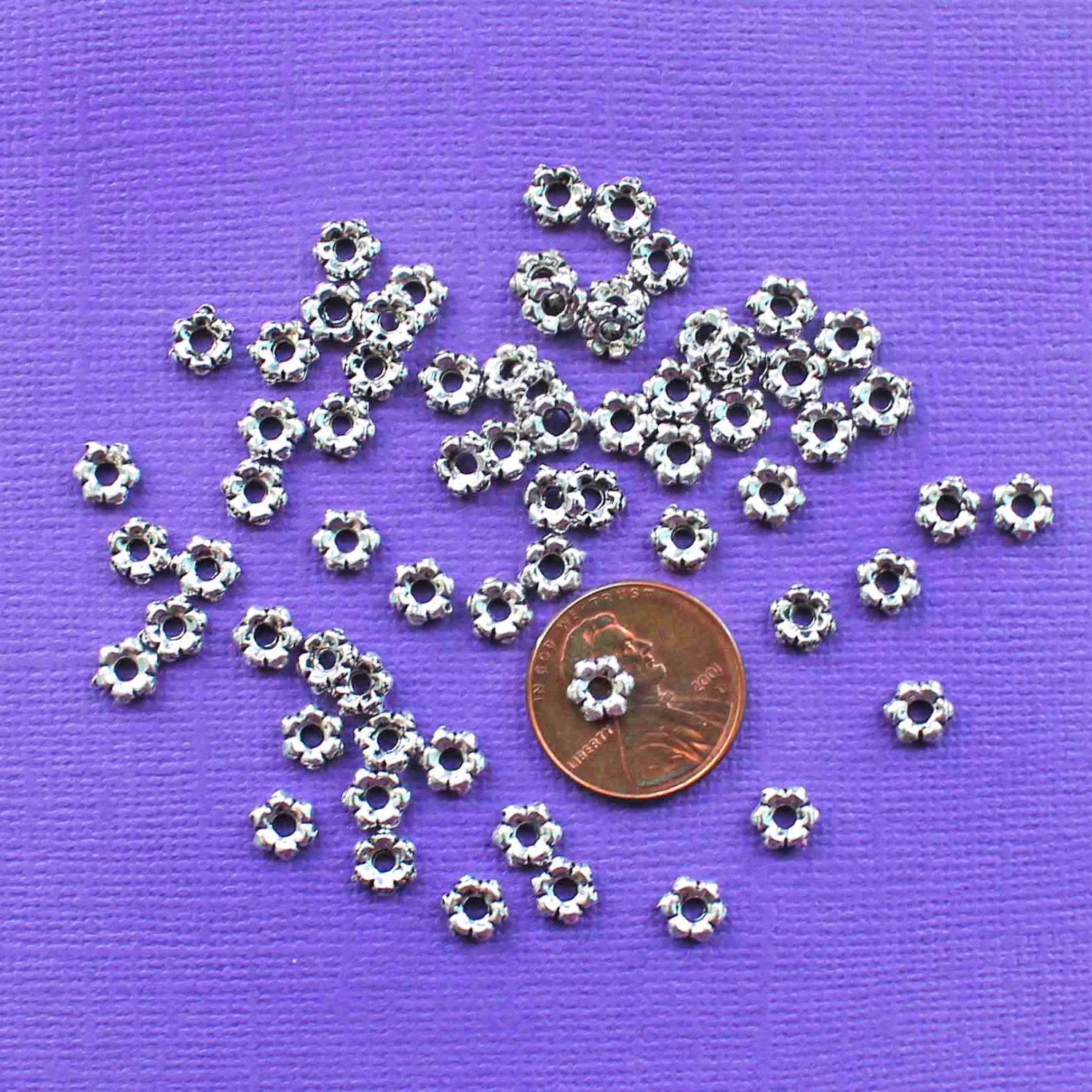 Perles d'espacement marguerite 6 mm - ton argent - 50 perles - SC6119
