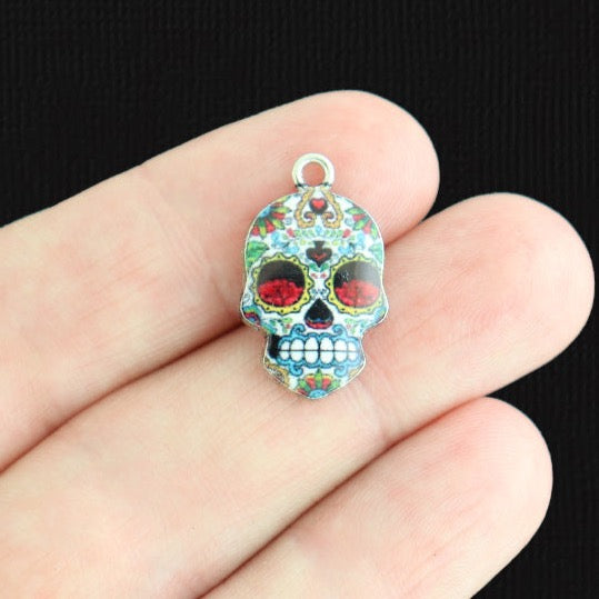 4 breloques en émail argenté tête de mort florale - E1563