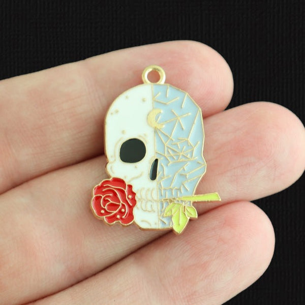 2 breloques tête de mort avec émail doré rose - E1607