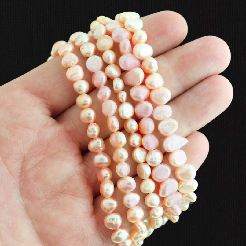 Pebble Glass Beads 4mm x 6mm - Pale Pink Imitation Pearl - 1 Strand 60 Beads - BD2786