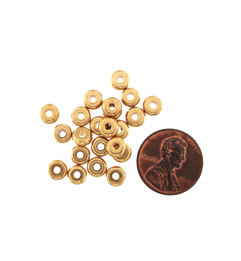 Perles d'espacement en acier inoxydable Rondelle 6 mm x 2,5 mm - ton or - 4 perles - FD783
