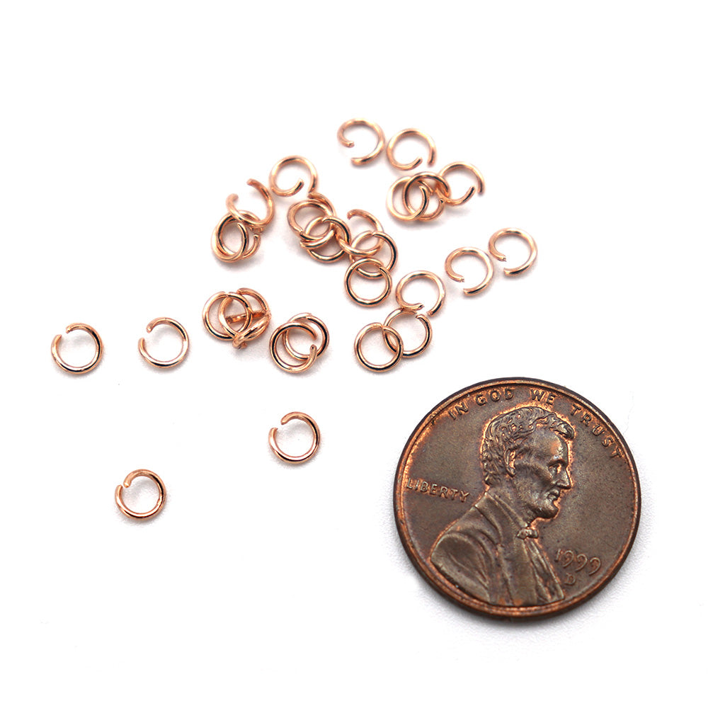 Anneaux de jonction en acier inoxydable or rose 4 mm x 0,6 mm - Calibre 22 ouvert - 25 anneaux - SS100