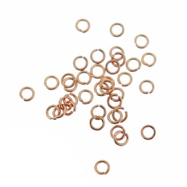 Anneaux de jonction en acier inoxydable or rose 4 mm x 0,8 mm - Calibre 20 ouvert - 25 anneaux - SS082