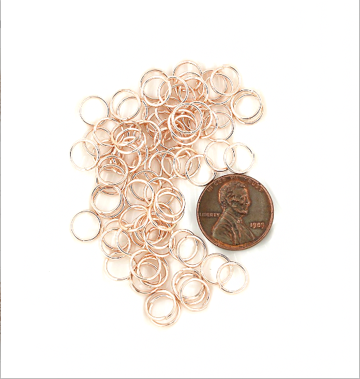 Anneaux de jonction couleur or rose 8 mm x 0,8 mm - Calibre 20 ouvert - 300 anneaux - J107