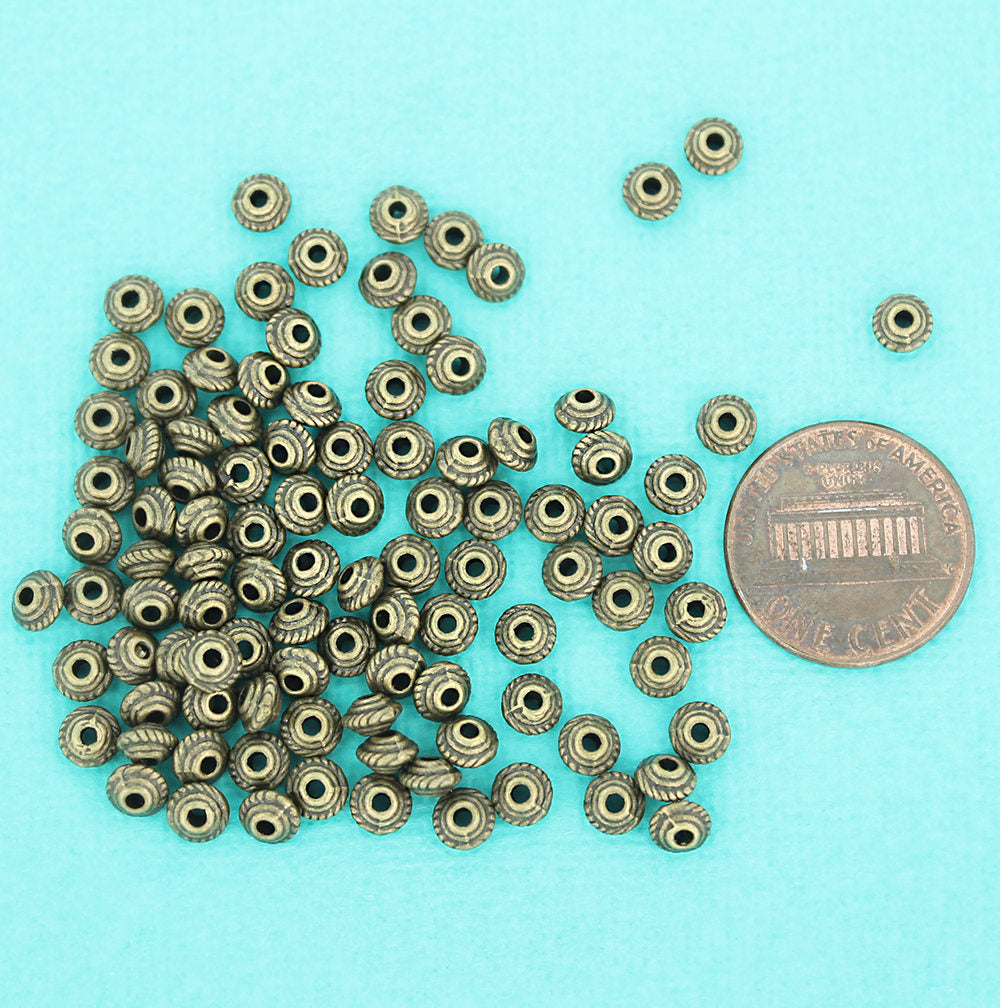 Perles d'espacement rondes 5 mm x 3 mm - ton bronze - 50 perles - BC1322