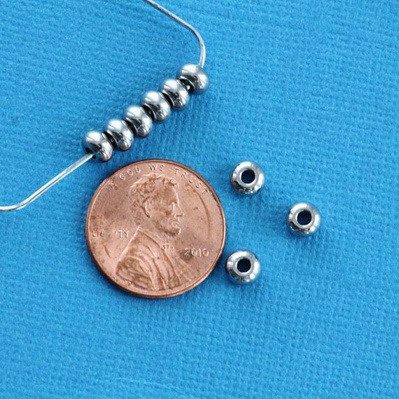 Perles Intercalaires Rondes 5mm x 3mm - Acier Inoxydable Argenté - 20 Perles - FD217