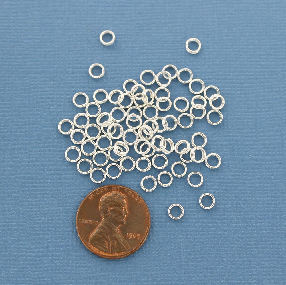 Anneaux fendus argentés 4 mm x 0,6 mm - Calibre 23 ouvert - 250 anneaux - J099