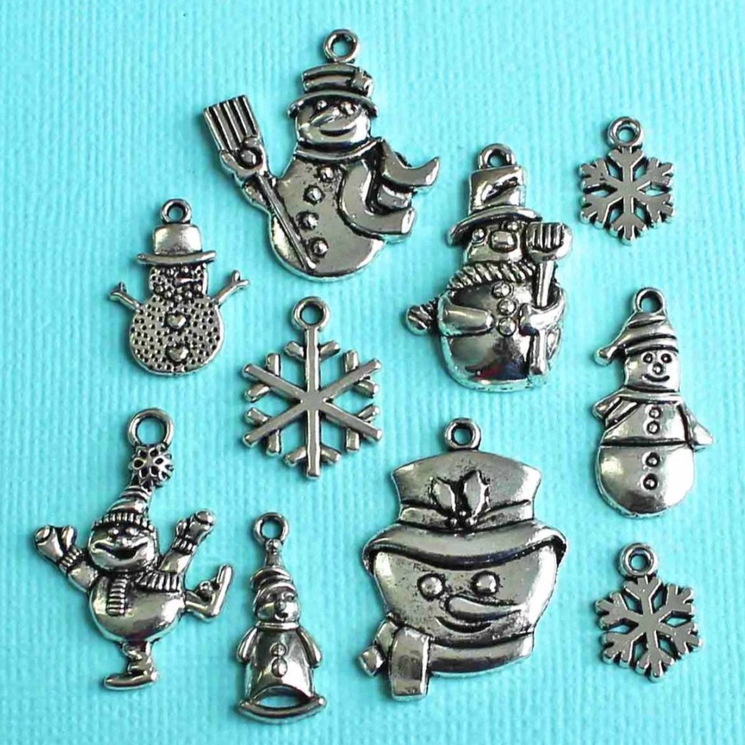 Collection de breloques bonhomme de neige ton argent antique 8 breloques - COL353