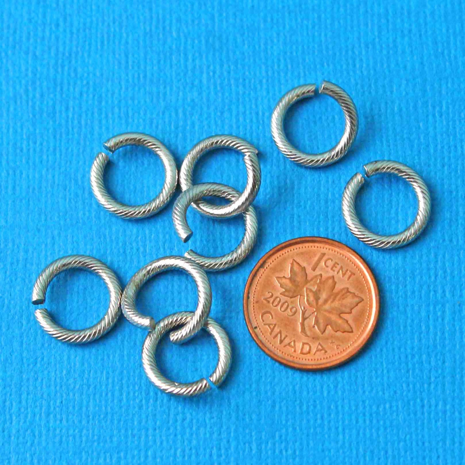 Anneaux de jonction en acier inoxydable 12,5 mm x 2 mm Texture tressée - Calibre 12 ouvert - 20 anneaux - SS013