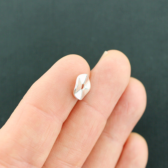 Perles d'espacement de rondelle 10 mm x 1 mm - ton argent - 25 perles - SC1537