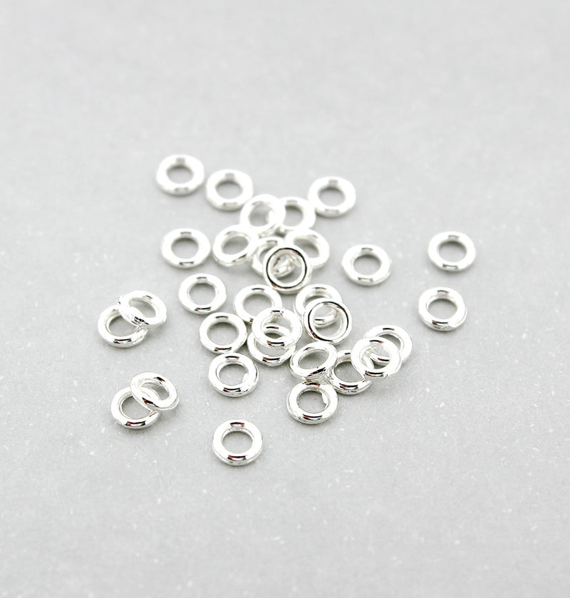Anneaux argentés 4 mm x 0,8 mm - Calibre 20 fermé - 500 anneaux - J188