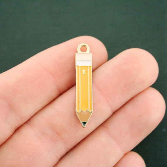 4 breloques en émail doré au crayon - E564