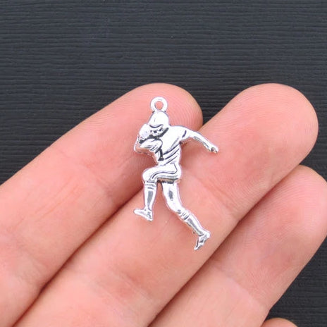 5 Football Player Antique Silver Tone Charms - SC3342