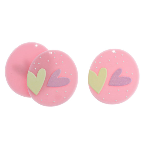 2 breloques en acrylique coeur rose - K078