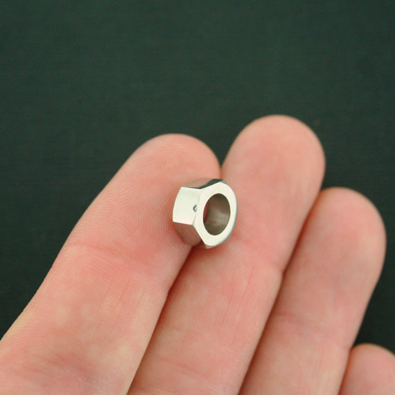 Perle d'espacement hexagonale en acier inoxydable 11 mm x 10 mm - ton argent - 1 perle - FD589