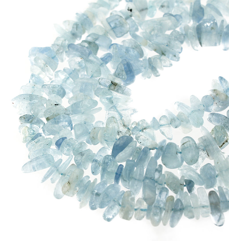 Perles d'aigue-marine naturelles Chip 5mm - 14mm - Bleus pastel - 1 brin 150 perles - BD1683