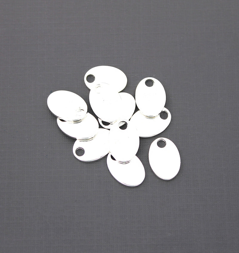 Ébauches d'estampage ovales - Acier inoxydable argenté - 17 mm x 12 mm - 20 étiquettes - FD745