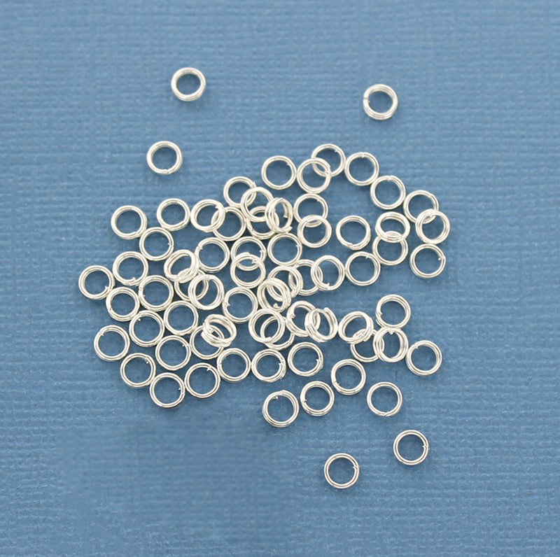 Anneaux fendus argentés 4 mm x 0,6 mm - Calibre 23 ouvert - 1000 anneaux - J099