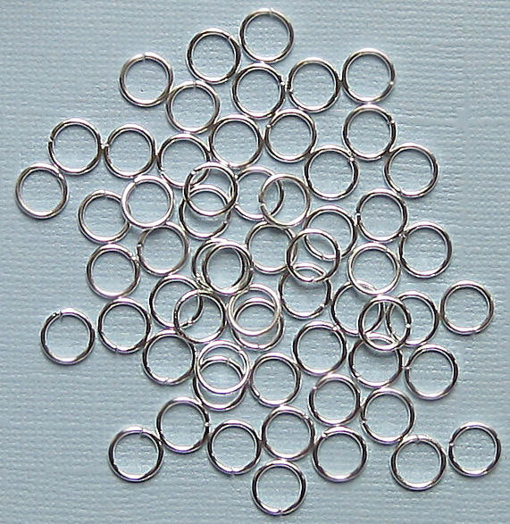 Anneaux argentés 7 mm x 1 mm - Calibre 18 ouvert - 500 anneaux - J024