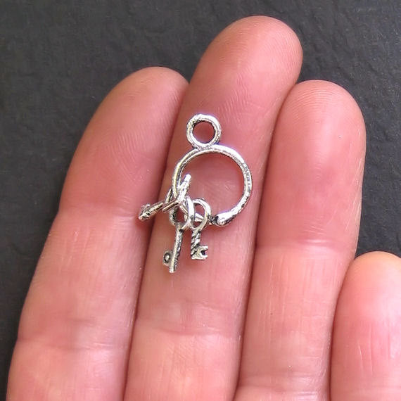 4 Key Set Antique Silver Tone Charms 2 Sided- SC636