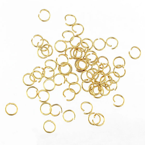 Anneaux en acier inoxydable doré 5 mm x 0,6 mm - Calibre 23 ouvert - 200 anneaux - J162