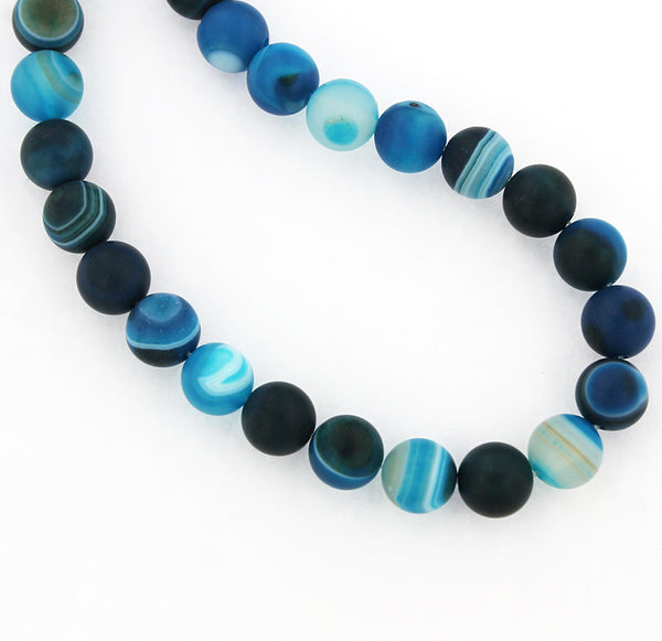 Perles rondes en agate naturelle 8 mm - Nuances givrées de bleu profond - 1 brin 48 perles - BD485