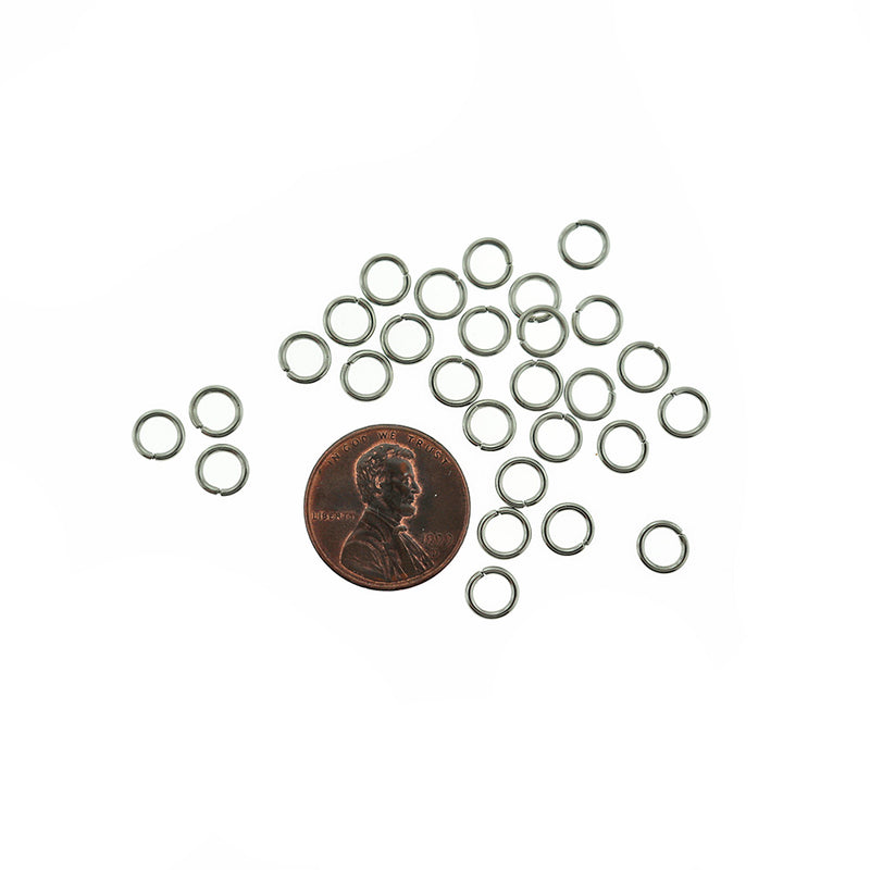 Anneaux de saut ton argent antique 6 mm x 1 mm - Calibre 18 ouvert - 500 anneaux - J022