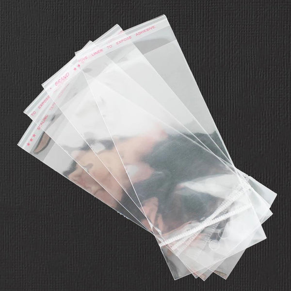 200 Cellophane Bags 150mm x 60mm Self Adhesive Seal - With Hole - TL023