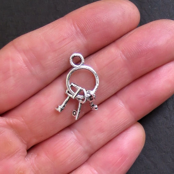 4 Key Set Antique Silver Tone Charms 2 Sided- SC636